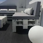 A Terrace On A Topfloor With A View