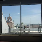 A Terrace On A Topfloor With A View